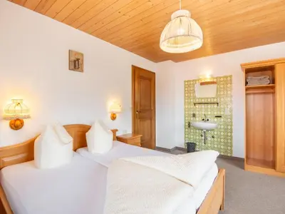 Ein Bett oder Betten in einem Zimmer der Unterkunft Chalet in Zell am Ziller near Ski Lift
