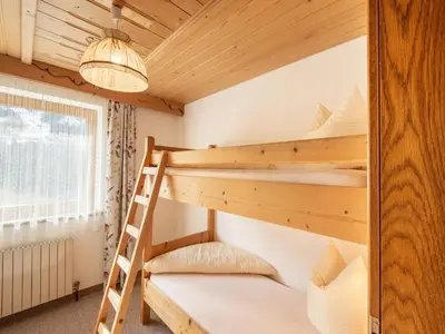 Ein Bett oder Betten in einem Zimmer der Unterkunft Chalet in Zell am Ziller near Ski Lift