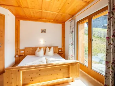 Ein Bett oder Betten in einem Zimmer der Unterkunft Chalet in Zell am Ziller near Ski Lift