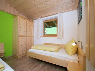 Ein Bett oder Betten in einem Zimmer der Unterkunft Chalet in Hopfgarten