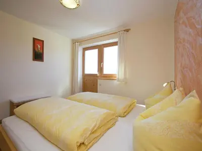 Ein Bett oder Betten in einem Zimmer der Unterkunft Chalet in Hopfgarten