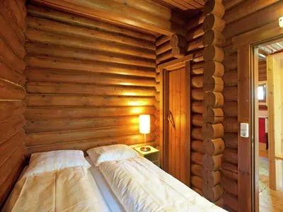 Ein Bett oder Betten in einem Zimmer der Unterkunft Chalet in Wörgl near SkiWelt Wilder Kaiser