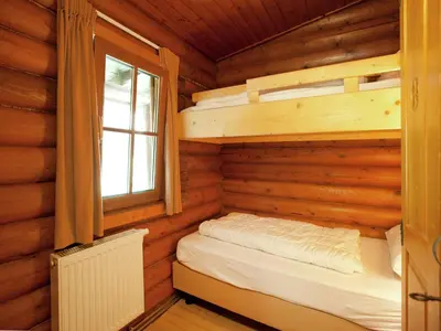 Ein Bett oder Betten in einem Zimmer der Unterkunft Chalet in the Wilder Kaiser ski area in Tyrol