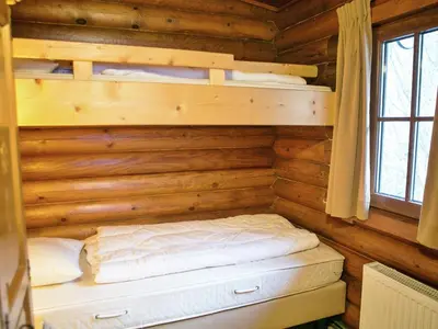Ein Bett oder Betten in einem Zimmer der Unterkunft Chalet in Wörgl near Ski Lift