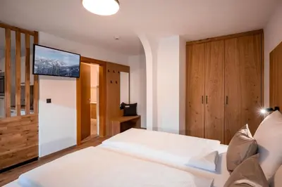 Ein Bett oder Betten in einem Zimmer der Unterkunft Appartementhaus Fuchs