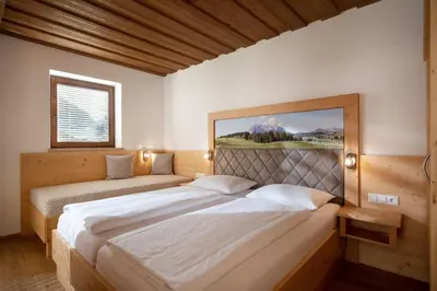 Ein Bett oder Betten in einem Zimmer der Unterkunft Appartementhaus Fuchs