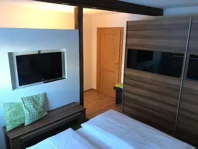 Ein Bett oder Betten in einem Zimmer der Unterkunft Apart Lisi