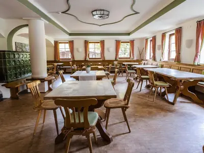 Ein Restaurant oder anderes Speiselokal in der Unterkunft Chalet in Angerberg near SkiWelt Slopes