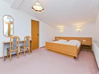 Ein Bett oder Betten in einem Zimmer der Unterkunft Chalet in Angerberg near SkiWelt Slopes
