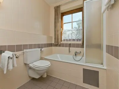 Ein Badezimmer in der Unterkunft Chalet in Angerberg near SkiWelt Slopes