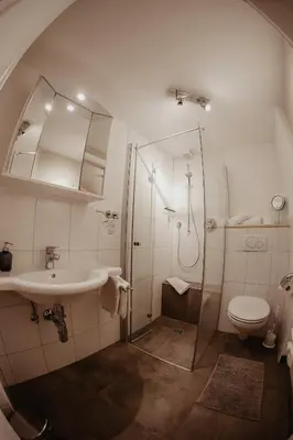 Ein Badezimmer in der Unterkunft Landhaus Alpengruss