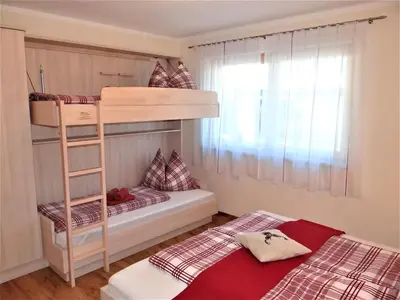 Ein Bett oder Betten in einem Zimmer der Unterkunft Apart Zillertal
