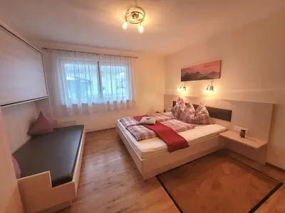 Ein Bett oder Betten in einem Zimmer der Unterkunft Apart Zillertal