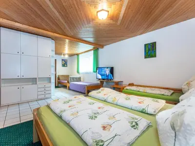 Ein Bett oder Betten in einem Zimmer der Unterkunft Chalet in Neukirchen near Ski Wildkogel