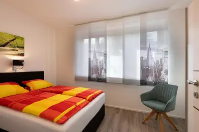 Ein Bett oder Betten in einem Zimmer der Unterkunft Ferienwohnung Weiss