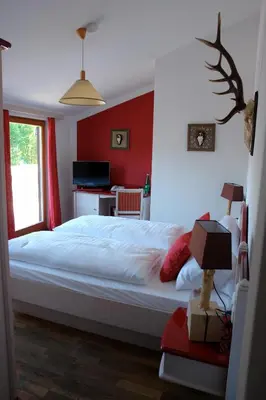 Ein Bett oder Betten in einem Zimmer der Unterkunft Hotel Gamshof