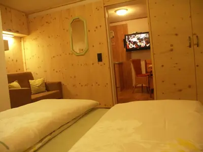 Ein Bett oder Betten in einem Zimmer der Unterkunft Ferienhof Obertenn