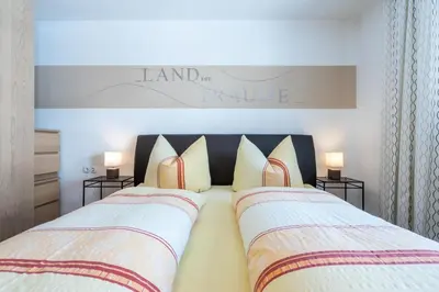 Ein Bett oder Betten in einem Zimmer der Unterkunft Apart Gruber