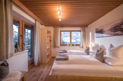 Ein Bett oder Betten in einem Zimmer der Unterkunft Landhaus Alpbach