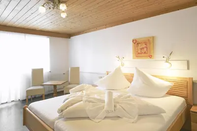 Ein Bett oder Betten in einem Zimmer der Unterkunft Hotel Gamshag