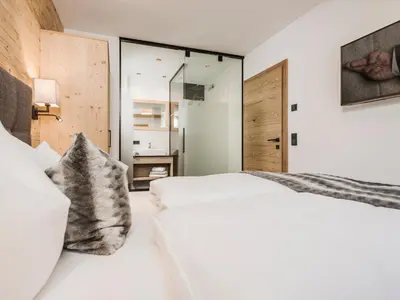 Ein Bett oder Betten in einem Zimmer der Unterkunft Feriendorf Joggler - Chalets nahe der Gondel