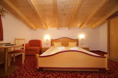 Ein Bett oder Betten in einem Zimmer der Unterkunft Altachhof Hotel und Ferienanlage - Jokercard im Sommer inklusive