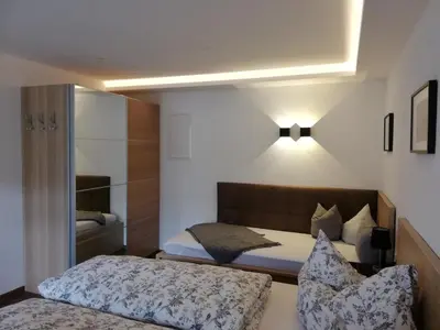 Ein Bett oder Betten in einem Zimmer der Unterkunft APART BRADL