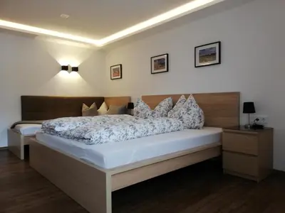 Ein Bett oder Betten in einem Zimmer der Unterkunft APART BRADL