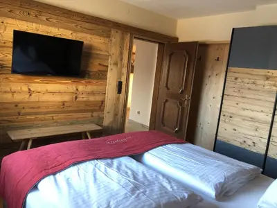 Ein Bett oder Betten in einem Zimmer der Unterkunft ArtiHome