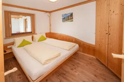 Ein Bett oder Betten in einem Zimmer der Unterkunft Apartments Rosenhof