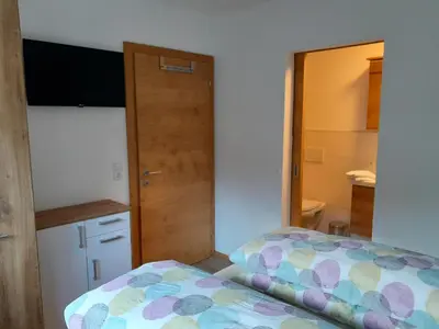 Ein Bett oder Betten in einem Zimmer der Unterkunft Apart Isabella