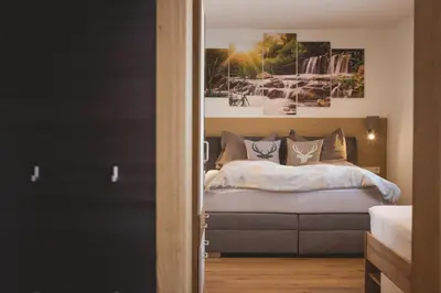 Ein Bett oder Betten in einem Zimmer der Unterkunft Appartements Bucher