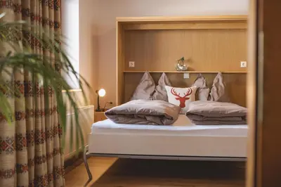 Ein Bett oder Betten in einem Zimmer der Unterkunft Appartements Bucher