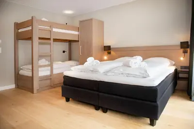 Ein Bett oder Betten in einem Zimmer der Unterkunft Gerlos Alpine Estate - Gerlos