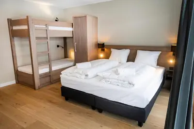 Ein Bett oder Betten in einem Zimmer der Unterkunft Gerlos Alpine Estate - Gerlos
