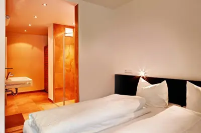 Ein Bett oder Betten in einem Zimmer der Unterkunft Gerlos Mountain Estate