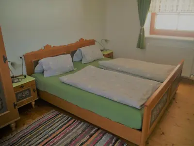 Ein Bett oder Betten in einem Zimmer der Unterkunft Neuschwendterhof