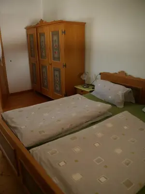 Ein Bett oder Betten in einem Zimmer der Unterkunft Neuschwendterhof