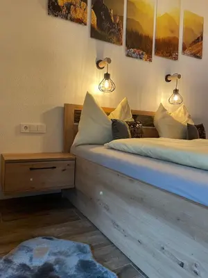 Ein Bett oder Betten in einem Zimmer der Unterkunft NeuhausLiving