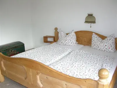 Ein Bett oder Betten in einem Zimmer der Unterkunft Haus Seeblick am See