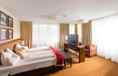 Ein Bett oder Betten in einem Zimmer der Unterkunft Hotel Stadt Kufstein