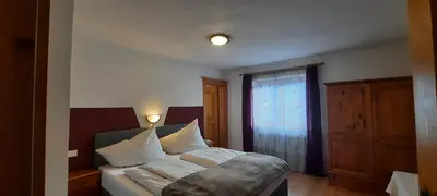 Ein Bett oder Betten in einem Zimmer der Unterkunft Haus Moikler
