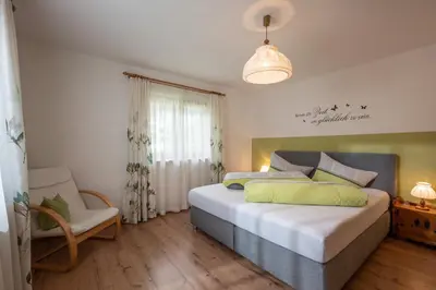 Ein Bett oder Betten in einem Zimmer der Unterkunft Haus Moikler
