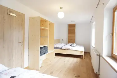 Ein Bett oder Betten in einem Zimmer der Unterkunft Ferienwohnung Litzlhof
