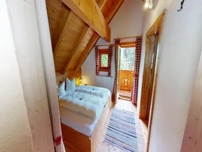 Ein Bett oder Betten in einem Zimmer der Unterkunft Chalet in Neukirchen