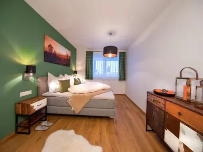 Ein Bett oder Betten in einem Zimmer der Unterkunft Apartment in the heart of Neukirchen