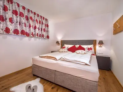 Ein Bett oder Betten in einem Zimmer der Unterkunft Apartment in Neukirchen by Wildkogelbahn