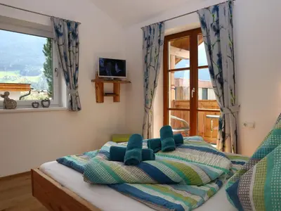 Ein Bett oder Betten in einem Zimmer der Unterkunft Apartment in Bramberg near Ski Lift
