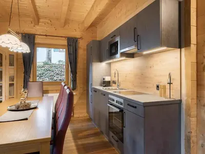 Küche/Küchenzeile in der Unterkunft Chalets Almdorf Zillertal, Fügen