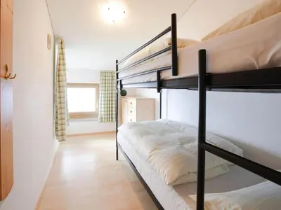 Ein Bett oder Betten in einem Zimmer der Unterkunft Holiday flats Bärlerhof, Königsleiten